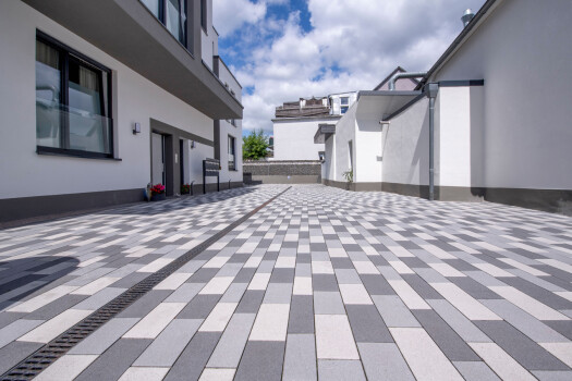 Corio Reihenverband Graubeige, Hellgrau und Anthrazit.